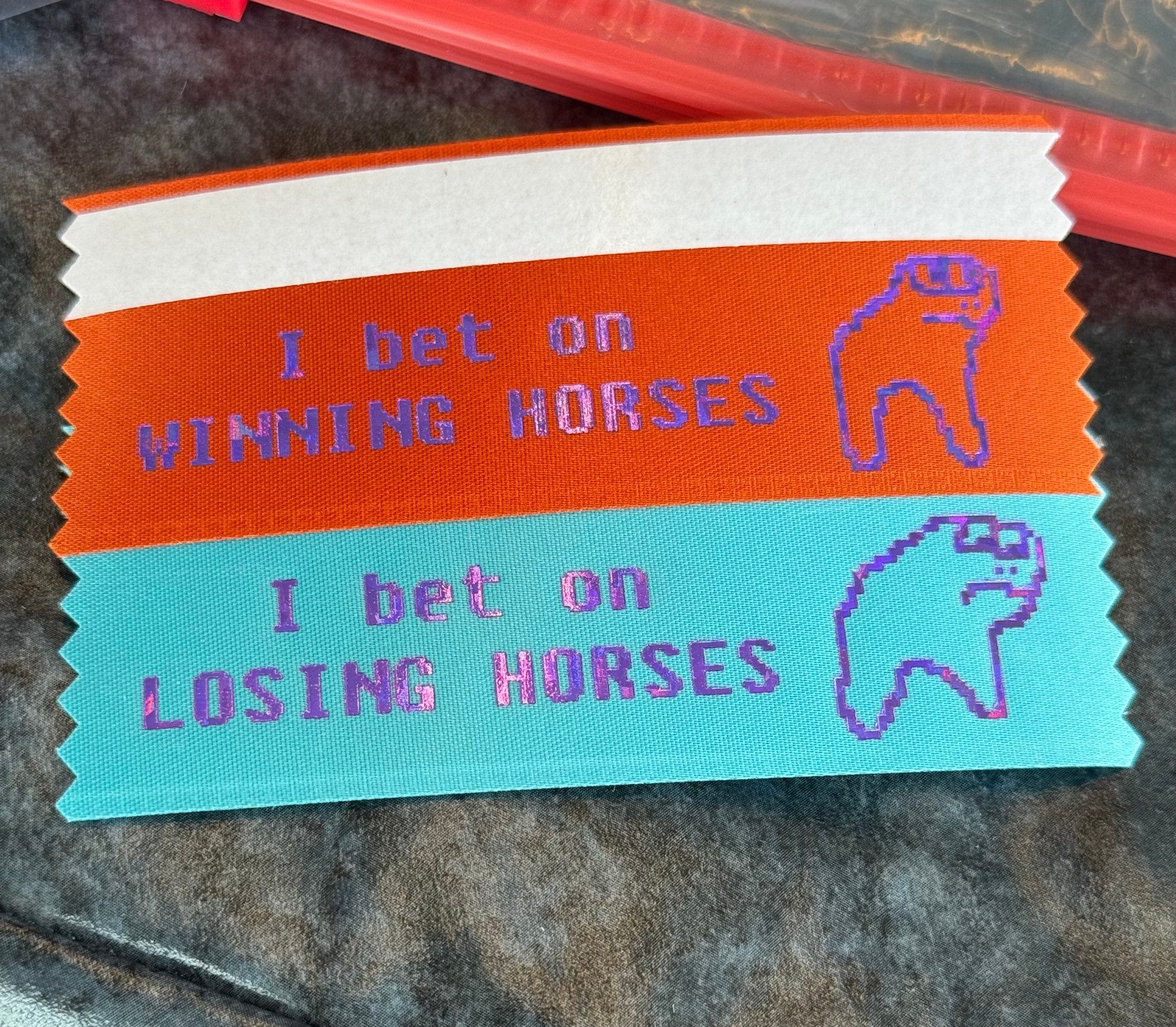 two horse race test ribbons